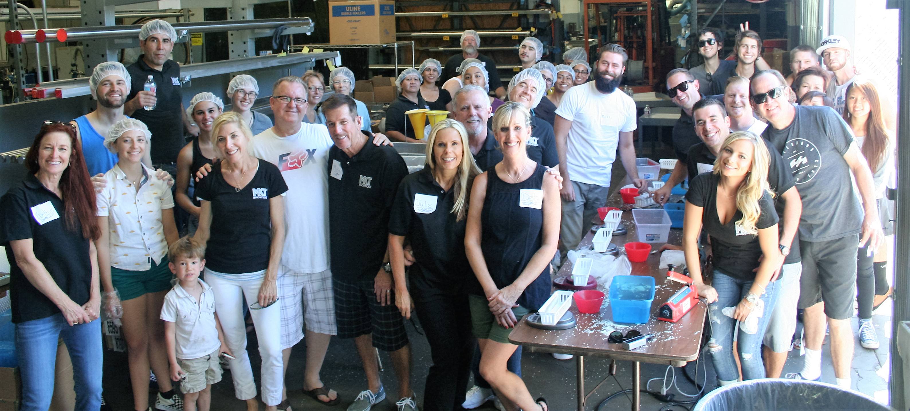 MKT Stop Hunger Now group in shop.jpg