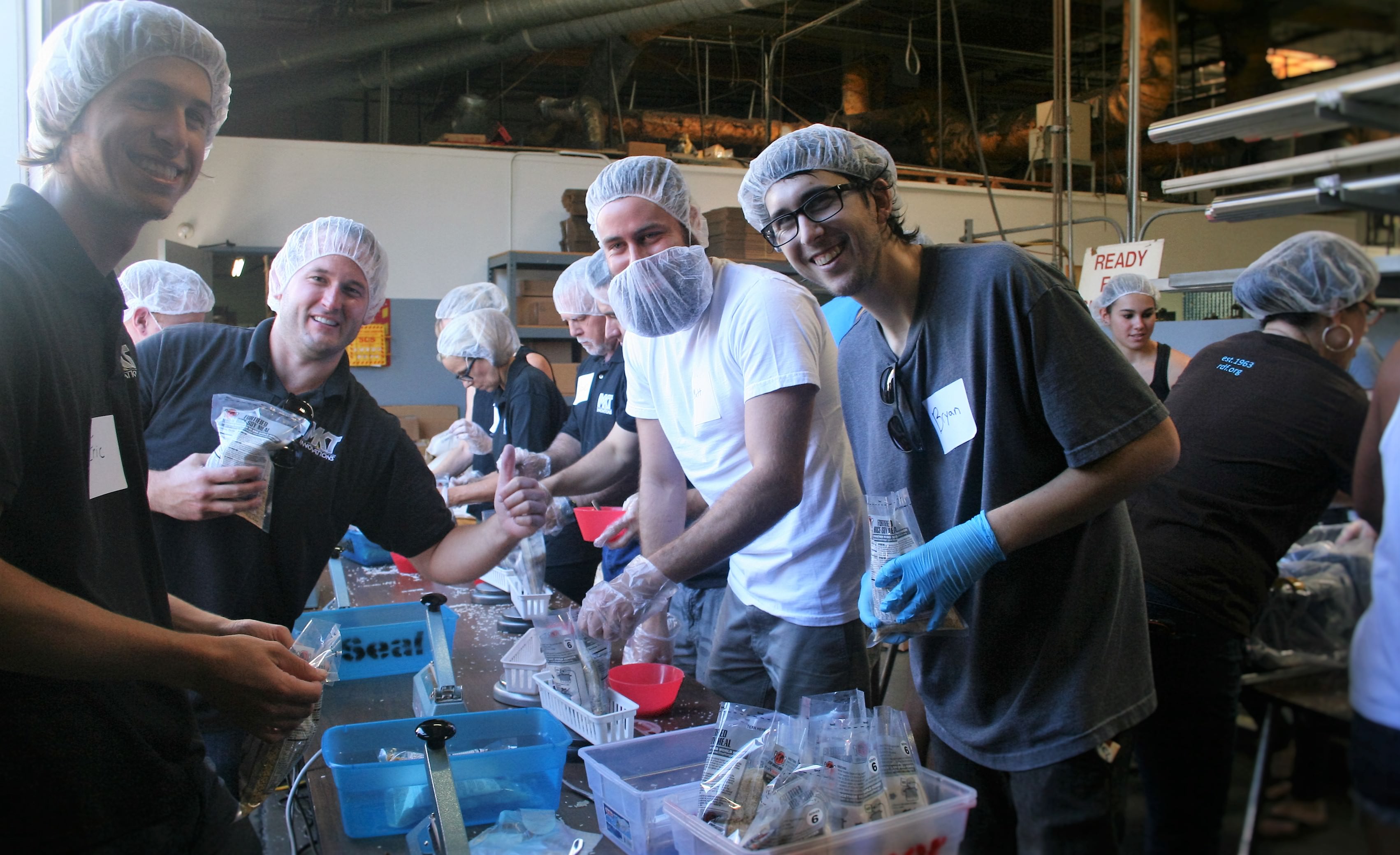 MKT Stop Hunger Now weighing station.JPG